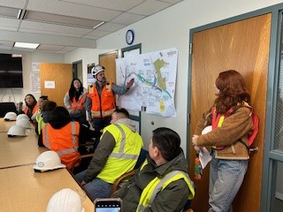 people in a classroom/briefing room